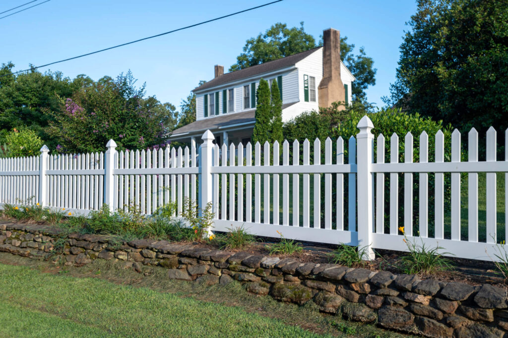 Vinyl picket fence.